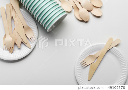 Wooden single use kitchenware and paper cups and Wooden single use kitchenware and paper cups and 49109378