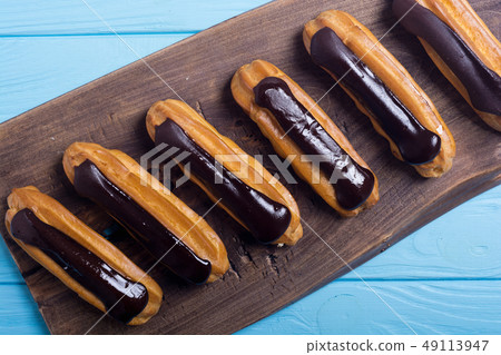 French dessert eclair with chocolate . French dessert eclair with chocolate . 49113947