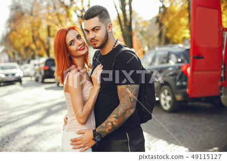 couple in a park couple in a park 49115127