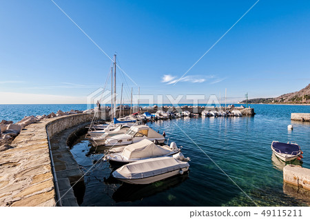 Boats moored in a small harbor in the Gulf of Boats moored in a small harbor in the Gulf of 49115211