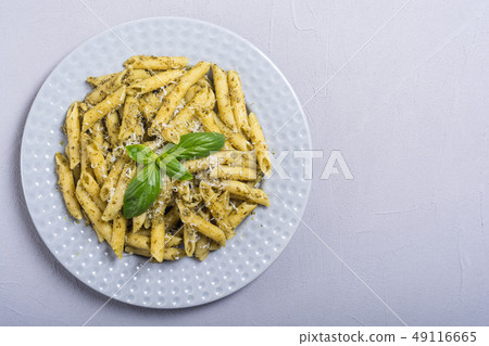 Italian penne pasta with sauce pesto Italian penne pasta with sauce pesto 49116665