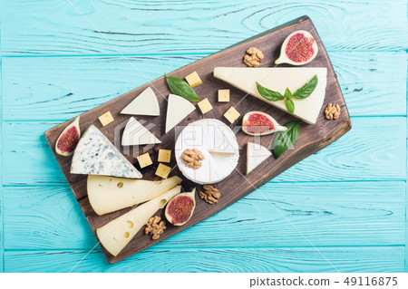 Cheeseboard with cheese brie , parmesan , 49116875