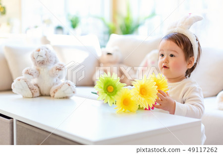 Toddler boy celebrating Easter 49117262