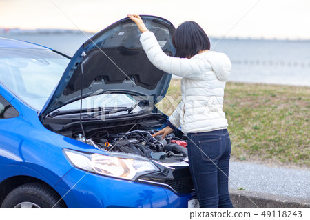 Car repair breakdown maintenance sports car bonnet gasoline repair oil replacement Car repair breakdown maintenance sports car bonnet gasoline repair oil replacement 49118243