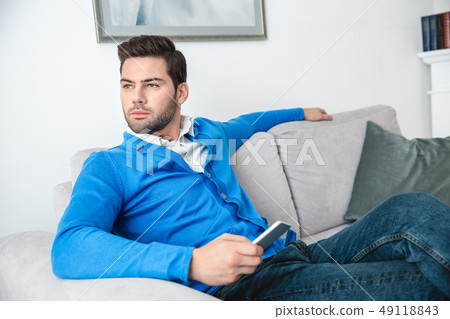 Young man patient waiting psychology session looking out the window 49118843