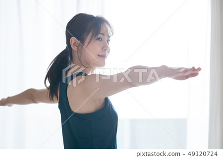 Young Woman Doing Yoga Japanese Hero Poses Hot Yoga 49120724