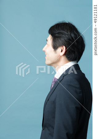 Businessman blue back 49121181