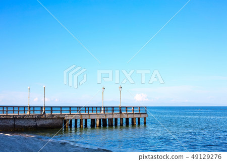 Wooden pier and blue sea 49129276