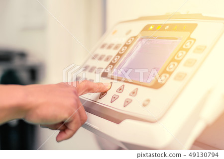 Hand pressing shutter switch control for x-ray Hand pressing shutter switch control for x-ray 49130794