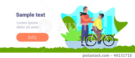 father and son learning to ride a bicycle outdoor man teaching boy cycling bike family having fun father and son learning to ride a bicycle outdoor man teaching boy cycling bike family having fun 49131718