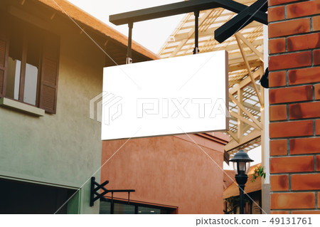 horizontal empty signage on clothes shop front 49131761