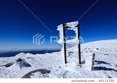 "Nagano Prefecture Kiso Komagatake" Signboard with blue sky and snow 49133780