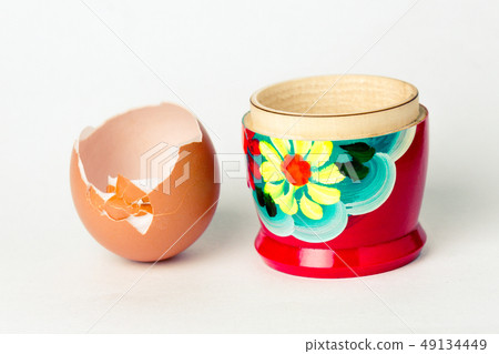 Matryoshka inside which lies a chicken egg Matryoshka inside which lies a chicken egg 49134449