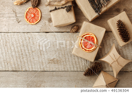 Rustic gift wrapped in craft paper with natural 49136304