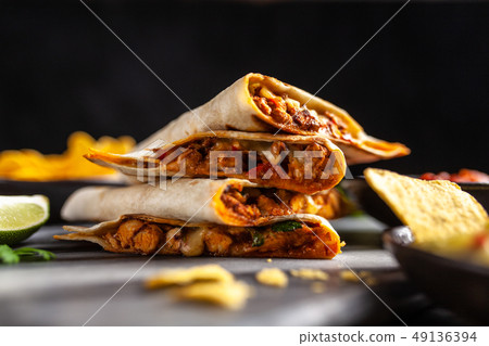 Chicken quesadillas with paprika and cheese 49136394