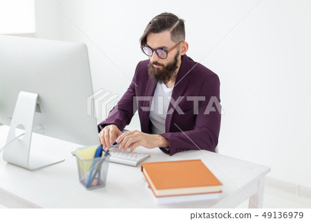 Illustrator, designer and technology concept - Side view handsome man with beard working on at the Illustrator, designer and technology concept - Side view handsome man with beard working on at the 49136979