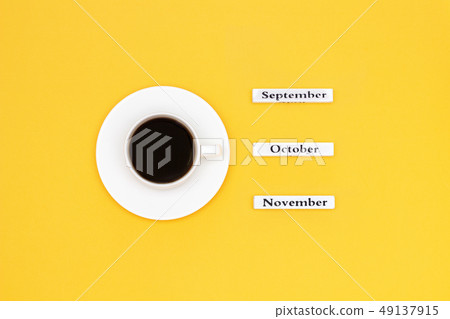 Cup of coffee and calendar November October 49137915