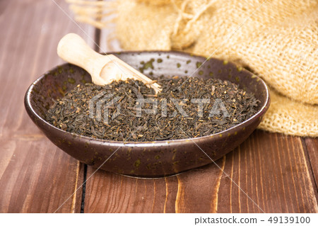 Black tea earl grey on brown wood Black tea earl grey on brown wood 49139100