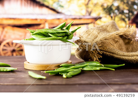 Green sugar snap pea with cart 49139259
