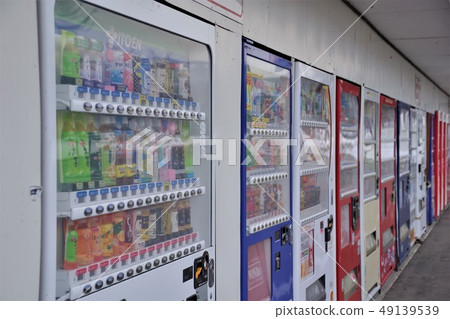 Many vending machines lined up 49139539