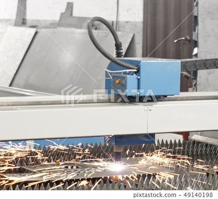 Modern CNC plasma laser cutting metal sheet. Modern CNC plasma laser cutting metal sheet. 49140198