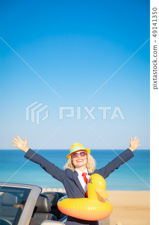 Successful young businesswoman on a beach 49141350