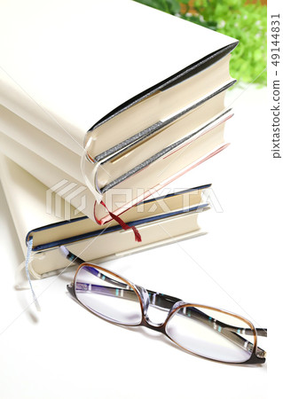 Glasses and books 49144831