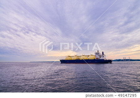 Huge LNG tanker navigating Tokyo Bay Huge LNG tanker navigating Tokyo Bay 49147295