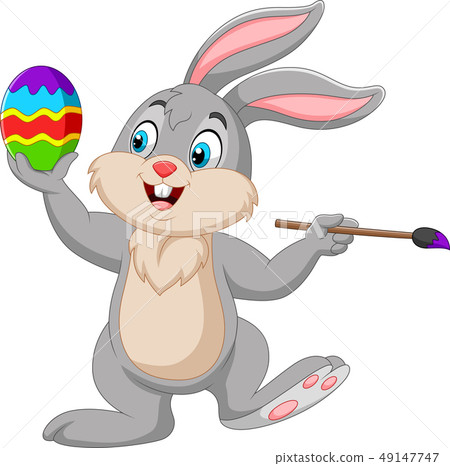 Cartoon rabbit painting an Easter egg 49147747