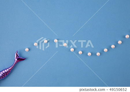 Mermaid with pearls on blue sea background Mermaid with pearls on blue sea background 49150652