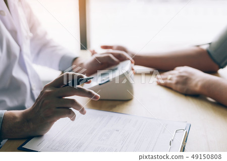 Doctor is explaining about blood pressure to the 49150808