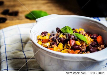 Chili corn carne on wood table Chili corn carne on wood table 49151004