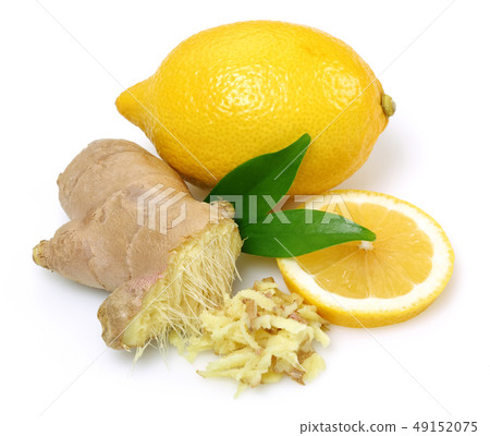 Fresh ginger root with leaves and lemon isolated Fresh ginger root with leaves and lemon isolated 49152075