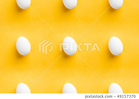 White eggs on the yellow 49157370