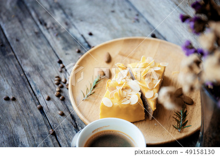 Cake and coffee on wooden. Cake and coffee on wooden. 49158130