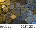 Collection of different coins background. Close 49158231