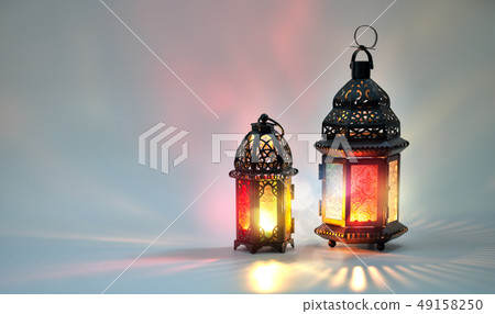 Arabic lantern with burning candle 49158250