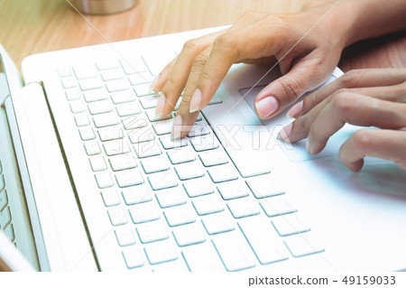 Woman using laptop computer. Working at home. Woman using laptop computer. Working at home. 49159033