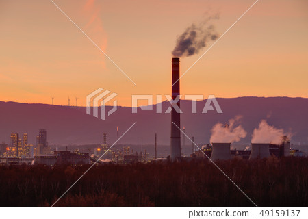 Heavy industry, petrochemical factory on sunset. Heavy industry, petrochemical factory on sunset. 49159137