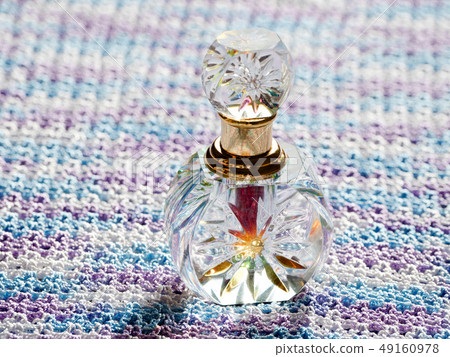 Arabian oud attar perfume in glass bottles. Arabian oud attar perfume in glass bottles. 49160978