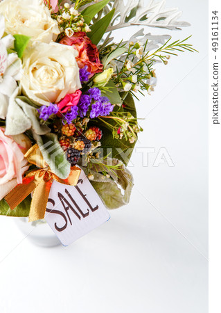 Photo of romantic bouquet of pink roses, lilies, green leaves with postcard 49161134