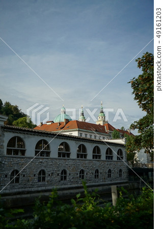 View of St. Nicholas Cathedral from the river (Ljubljana) 49161203