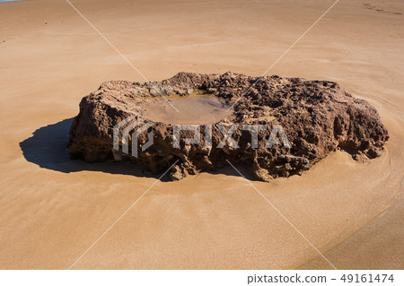 Rock on a sandy beach, Morocco Rock on a sandy beach, Morocco 49161474