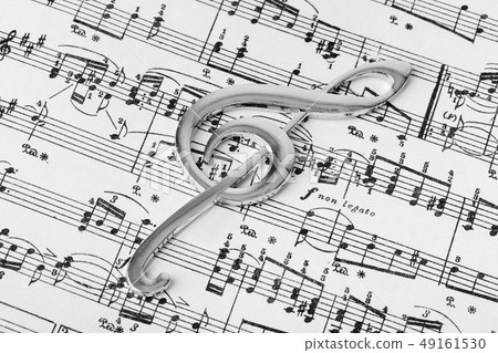 Treble clef on music sheet - musical background Treble clef on music sheet - musical background 49161530