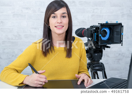 young woman designer using graphics tablet for 49161758