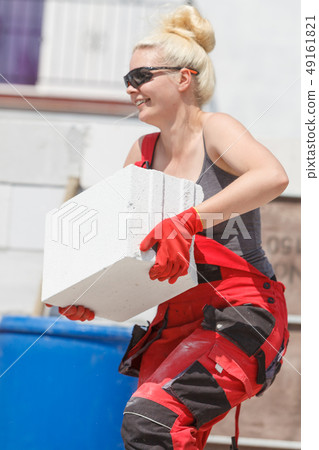 Woman working with airbricks 49161821