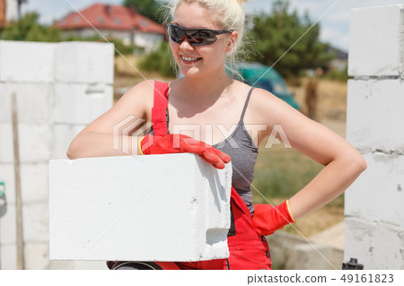 Woman working with airbricks 49161823