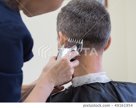 Haircut machine. Man clipping machine in salon. Haircut machine. Man clipping machine in salon. 49161954