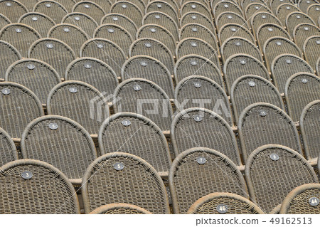 Rows of seats in open air concert hall auditorium 49162513