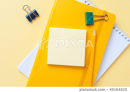 Bright yellow office workplace 49164829
